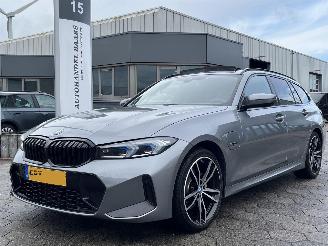 Vaurioauto  passenger cars BMW 3-serie Touring 330e xDrive 2023/2