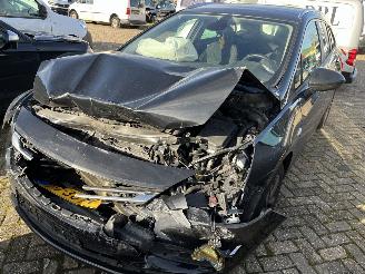 damaged Opel Astra Sports Tourer 1.0 Online Edition