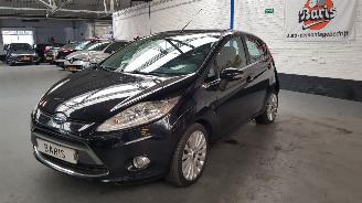 Damaged car Ford Fiesta 1.4 16V AUT 4 DRS  BENZ 1.388CC 71KW 97PK KM 33773 N.A.P. 2009/2