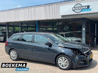 Damaged car Peugeot 308 SW 1.2 PureTech Blue Lease Navigatie Climate Cruise 2019/7