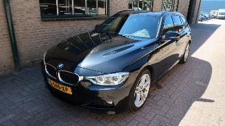 Damaged car BMW 3-serie BMW 3-serie Touring 320i Edition M Sport Shadow High Executive 2018/4