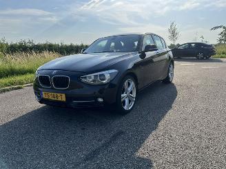 Damaged car BMW 1-serie 114i EDE High Executive 2014/5