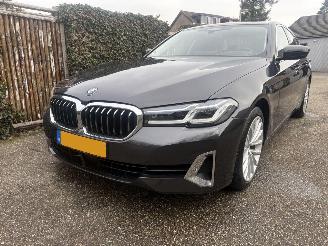 Schadeauto BMW 5-serie HYBRIDE/DIESEL 193PK AUTOMAAT BUSINESS LINE PLUS 2023/5