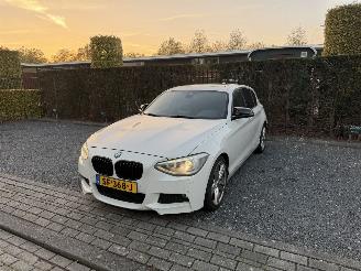 Schadeauto BMW 1-serie 116i Pano 2011/12