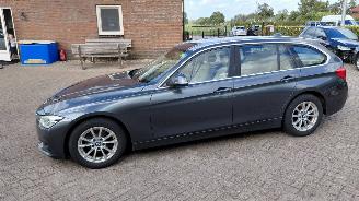 Unfallwagen BMW 3-serie 320i  184 pk clima leer 2016/7