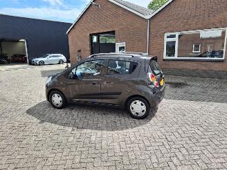 Damaged car Chevrolet Spark 1.0i  68pk lpg   airco 2011/7