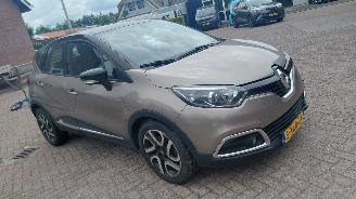 Damaged car Renault Captur 1.2 tce 88kw   navi clima  automaat 2014/11