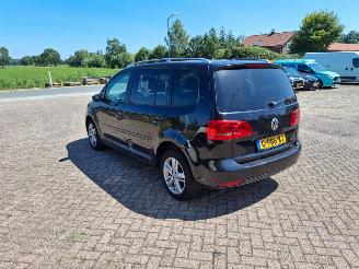Damaged car Volkswagen Touran 1.4 tsi  140pk  automaat   7 persoons  pano 2012/7