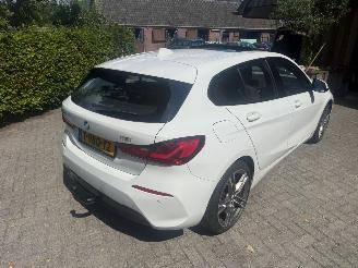 damaged passenger cars BMW 1-serie 118I AUT! PANO HIGH EXECUTIVE 77800KM 2020/2
