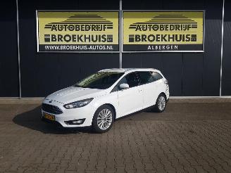 damaged passenger cars Ford Focus Wagon 1.0 Titanium Edition 2015/11