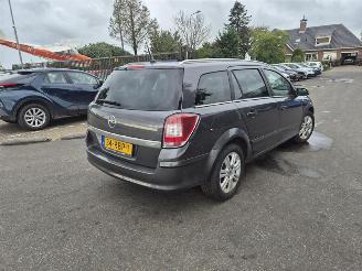 damaged passenger cars Opel Astra STATION WAGON 1.7 CDTi 2009/1