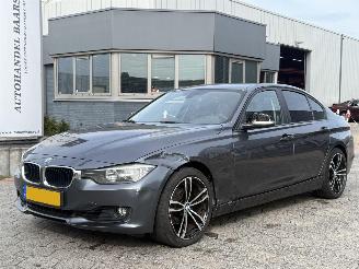 Damaged car BMW 3-serie 320i Executive AUTOMAAT 2012/5