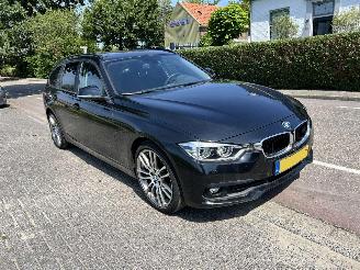 Unfallwagen BMW 3-serie Touring 318d High Executive 2018/5