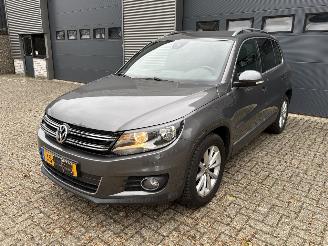 Vaurioauto  passenger cars Volkswagen Tiguan 1.4 TSI Sport&Style NAVI / CRUISE / CAMERA 2015/11