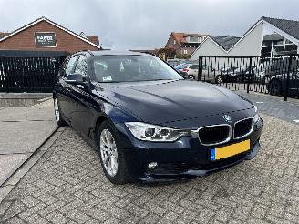 Vaurioauto  passenger cars BMW 3-serie Touring -  320i High Executive 2013/10