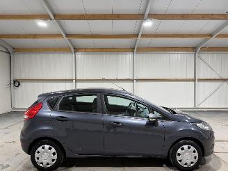 Damaged car Ford Fiesta 1.25 44kW Limited Airco 2009/11