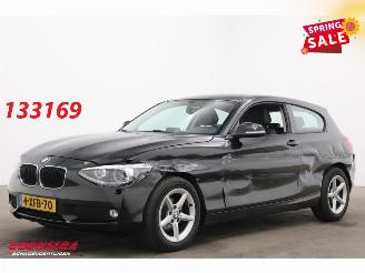 Damaged car BMW 1-serie 116d Leder Bixenon Navi Airco Cruise SHZ PDC 2014/7