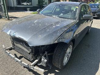 krockskadad bil auto BMW 3-serie 320e Touring xDrive Business Automaat 2021/11