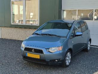 damaged passenger cars Mitsubishi Colt 1.3 Edition Airco Cruise Tr.haak 2012/2