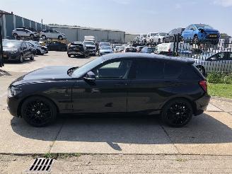Damaged car BMW 1-serie 114i Sport 5 drs 2013/6