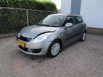 damaged passenger cars Suzuki Swift 1.2 Airco 5-Drs 2013/12