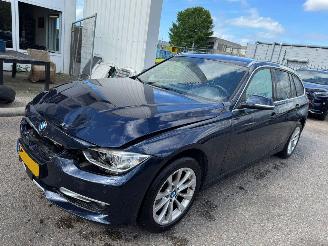 Schadeauto BMW 3-serie 320i AUTOMAAT Executive Sport 2013/5