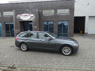 damaged passenger cars BMW 3-serie Touring 318i Cent.Hi.Ex. 2017/1