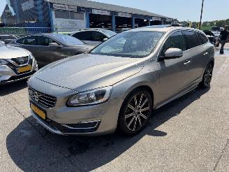 Damaged car Volvo V-60 2.4 D6 AWD 158W PHEV Schuifdak Clima Navi Leer Camera Summum NAP 2013/12