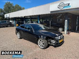 skadebil auto Mercedes C-klasse 180 Coupe Facelift Navi H&K Clima Stoelverw. 2011/7