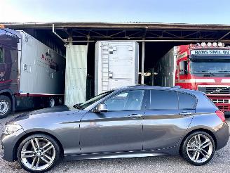 Schadeauto BMW 1-serie 120i 177pk 8-traps aut M-Sport - schuifdak - navi - pdc - keyless - alcantara - zwarte hemel - stoelverw 2015/7