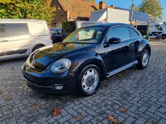 Damaged car Volkswagen Beetle 1.2 TSI Airco Stoelverw. Leder 2013/5