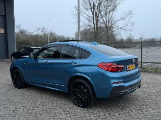 Vaurioauto  passenger cars BMW X4 M40i 360Pk Centenial High Executive Schuifdak Harman Kardon Head-Up 2016/9