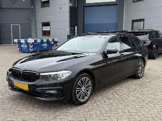 Schadeauto BMW 5-serie 520D Touring Executive 2017/9