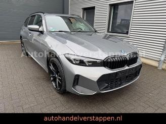 damaged passenger cars BMW 3-serie 0e xDrive Touring M Sport Pano Harman AHK 2022/11